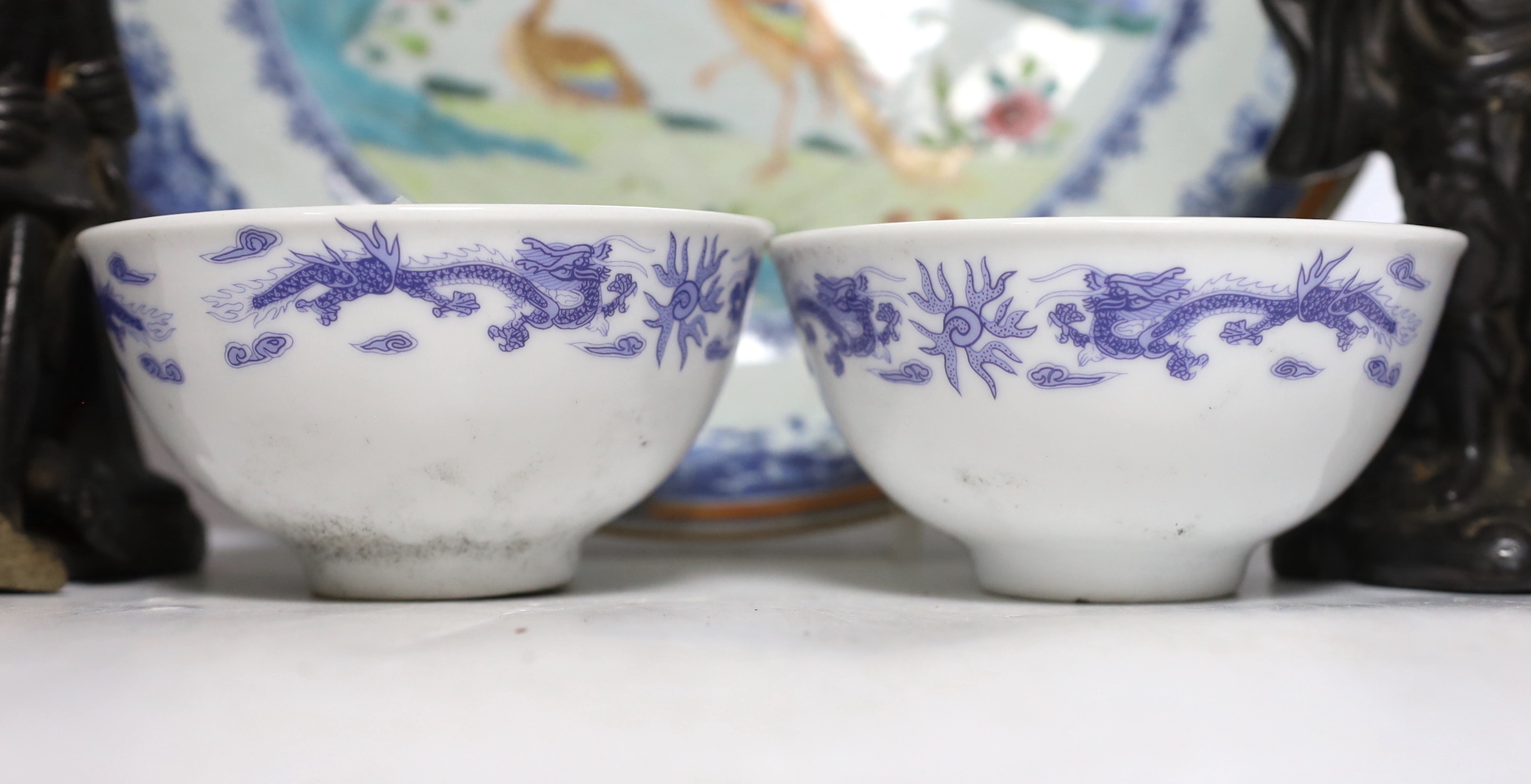 Two Chinese pottery figures of luohan, damaged, 15.5cm and an 18th-century Chinese export famille rose twin pheasant dish and a pair of blue and white bowls, the largest 30cm in diameter